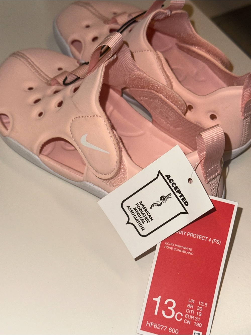 Nike Kids Pink Slide Sandals with White Swoosh
